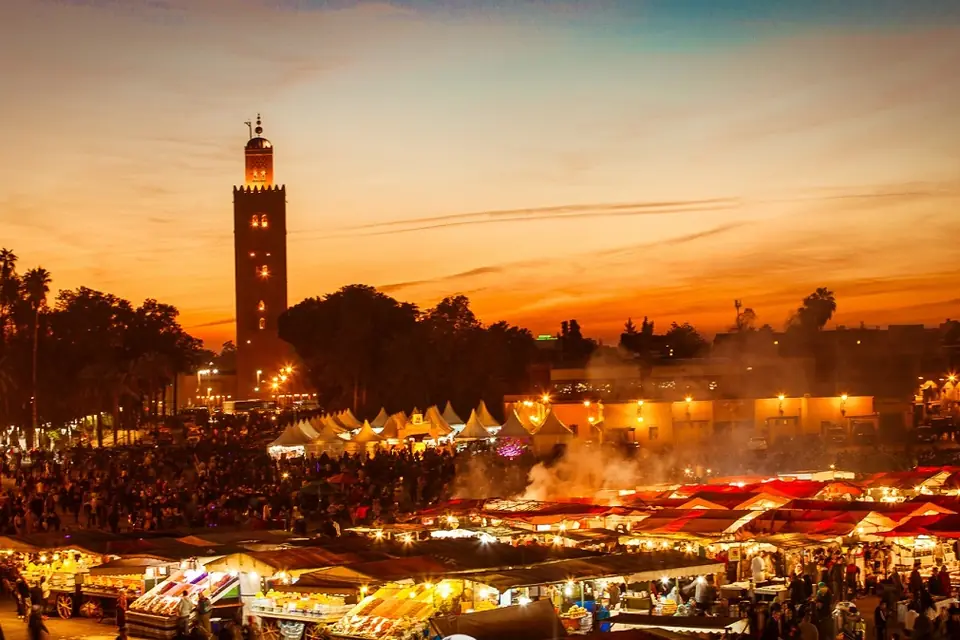 Jemaa el-Fna square and the Koutoubia in Marrakech at sunset